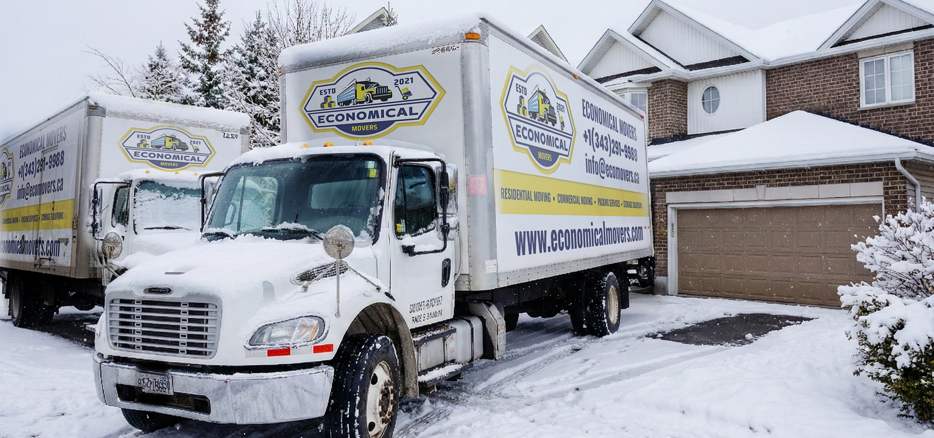Image mention the Economical Movers Trucks ready for Holiday moving in Canada for a safe winter moving practices during snowy and icy conditions.